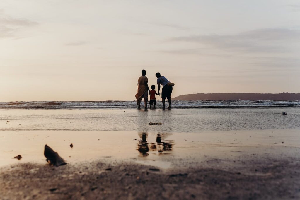 Family Vacations in South America, Photo of Three People Standing on Beach